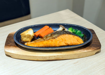 Close-up of food in plate on table