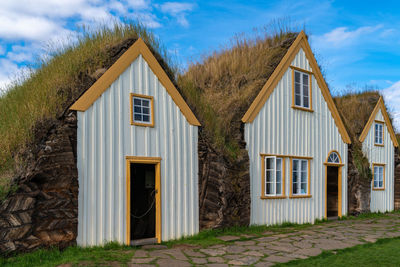 Exterior of house and tree against sky