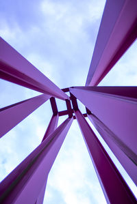 Low angle view of metallic structure against sky