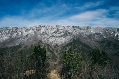 Scenic view of rocky mountains against sky