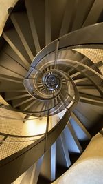 Low angle view of spiral staircase in building