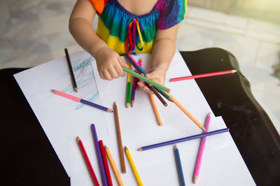 High angle view of colored pencils on table