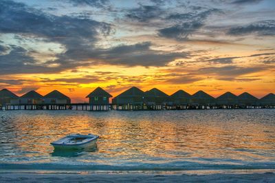 Scenic view of sea against sky at sunset