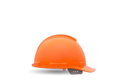 Close-up of orange hat against white background