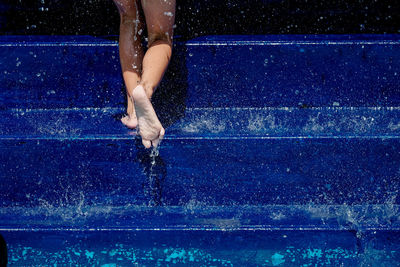 Woman swimming in pool