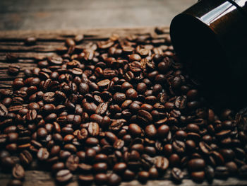 Close-up of coffee beans on table