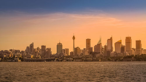 View of buildings against sky during sunset
