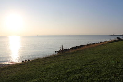 Scenic view of sea against sky during sunset
