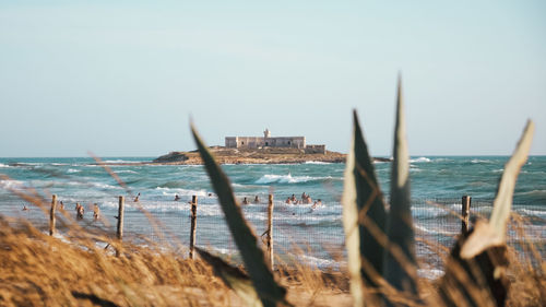 Panoramic view of sea against clear sky