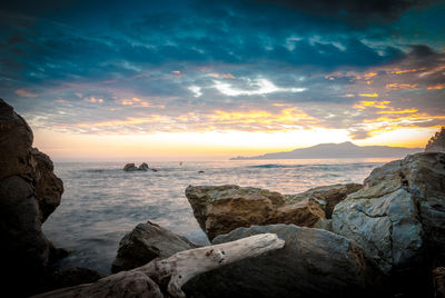 Scenic view of sea at sunset