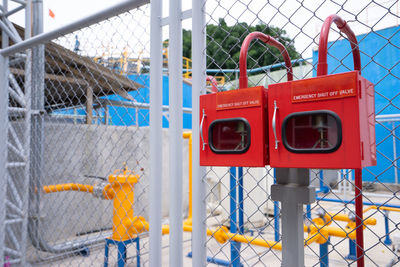 Close-up of valve on fence