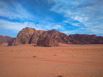 Scenic view of desert against sky