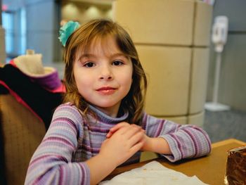 Portrait of cute girl at home