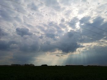 Low angle view of field against sky