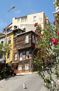 Street amidst buildings against sky