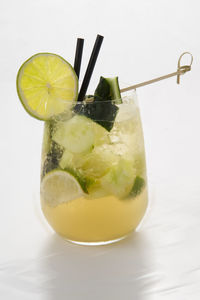 Close-up of drink over white background