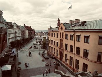 High angle view of street amidst buildings in town