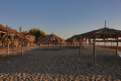 Scenic view of beach against clear sky