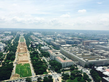 High angle view of buildings in city against sky