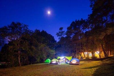 View of tent on field against sky at night