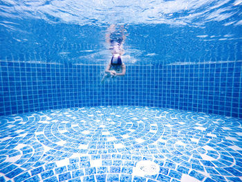 Girl swimming in pool