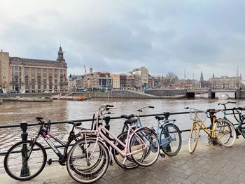 Bicycles on street against sky