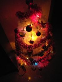 Close-up of illuminated christmas tree at night