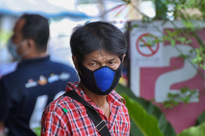 Close-up of man wearing mask