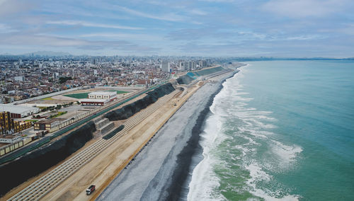 Lima, peru. october, 2022. aerial view of construction of highway costa verde, la perla district.