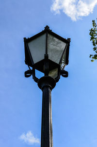 Low angle view of street light against sky