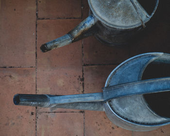 High angle view of metallic equipment on floor