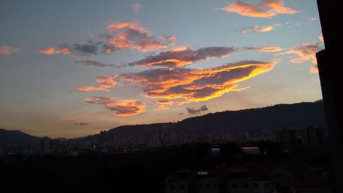 Scenic view of mountains at sunset