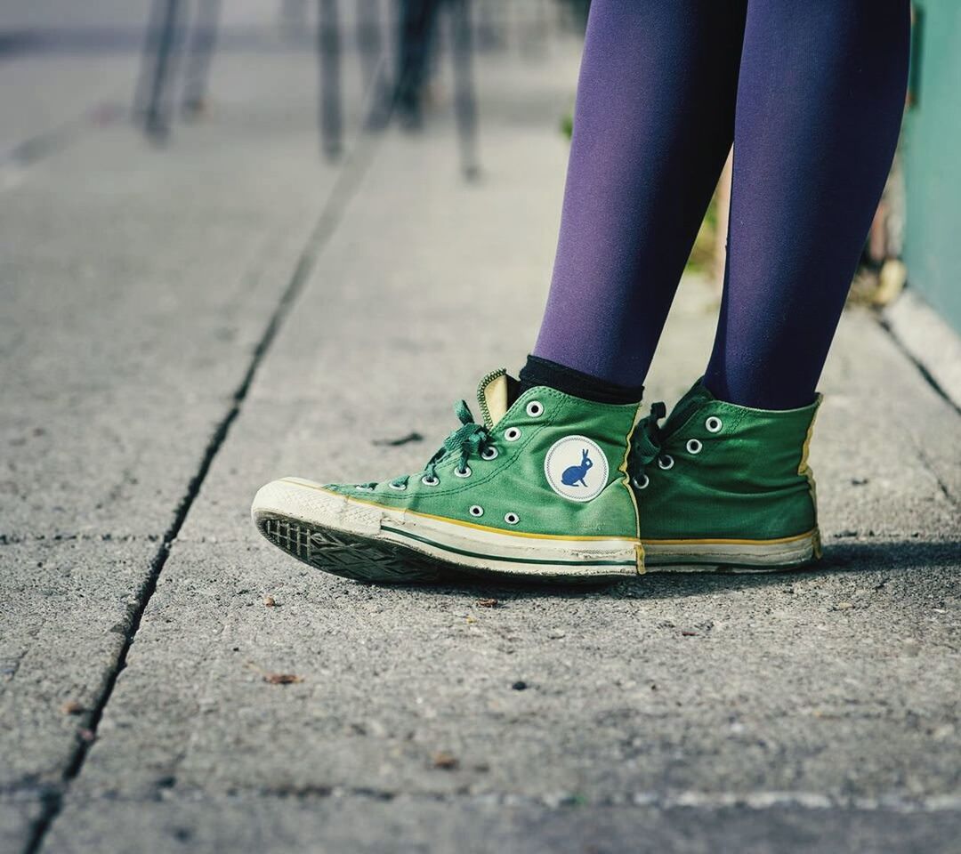 low section, person, shoe, footwear, street, lifestyles, human foot, jeans, standing, selective focus, men, road, leisure activity, focus on foreground, fashion, skateboard, sidewalk