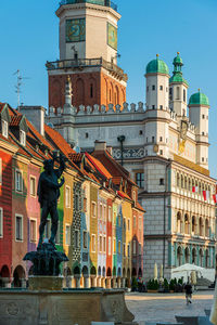 Buildings in city against sky