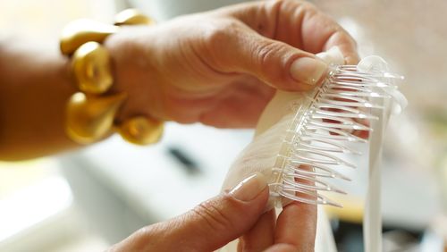 Close-up of hand holding ice cream