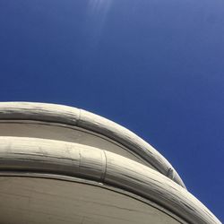 Low angle view of building against blue sky