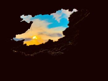 Low angle view of silhouette mountain against sky during sunset