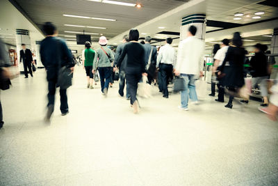 Group of people walking in city