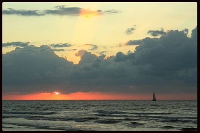 Scenic view of sea at sunset