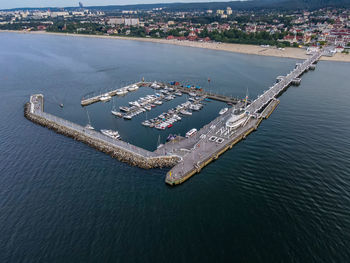 High angle view of harbor by sea