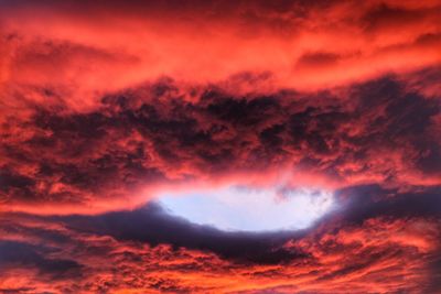 Low angle view of dramatic sky during sunset