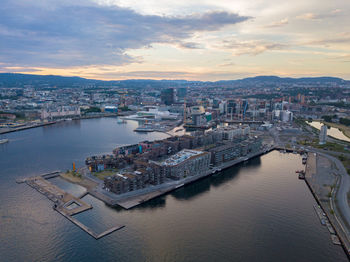 High angle view of river amidst buildings in city