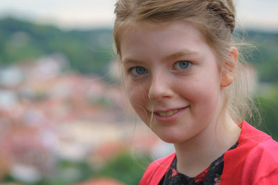 Close-up portrait of smiling woman