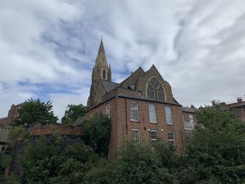 Low angle view of historic building against sky