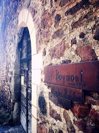 Text on wall of old building