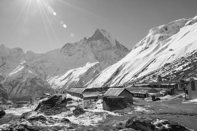 Scenic view of snowcapped mountains against sky