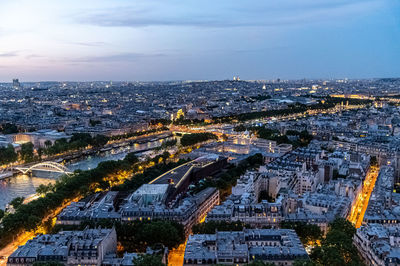 High angle view of city buildings against sky