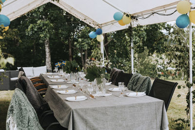 Gazebo with set table in garden