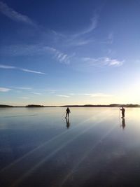 Reflection of people in water