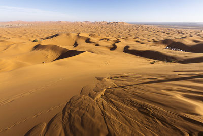 Scenic view of desert against sky